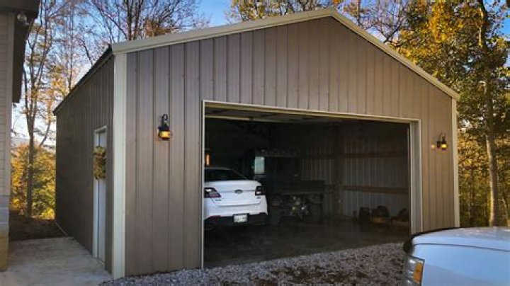 How many cars can an American worker make if he or she makes no grain at all?