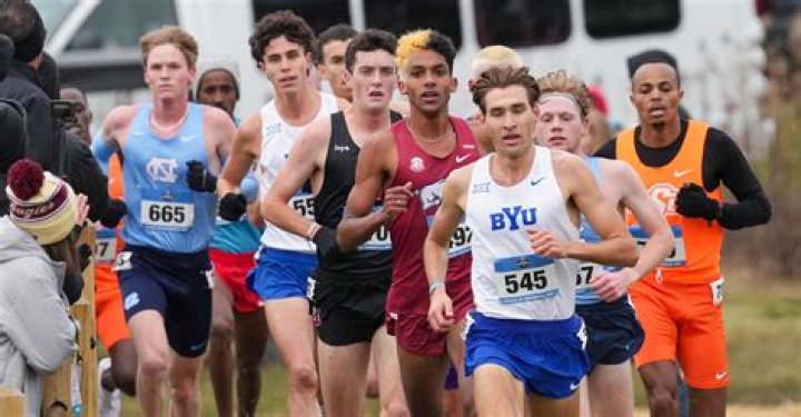 How much does a d1 cross country coach make?